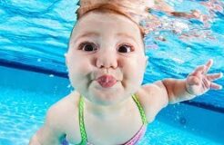 Funny Baby Getting In The Swimming Pool